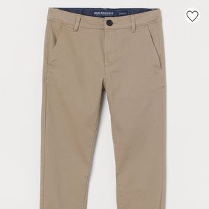 H&M slim fit chino’s in stretch cotton twill.  Size 14 (11-12 years) Like new